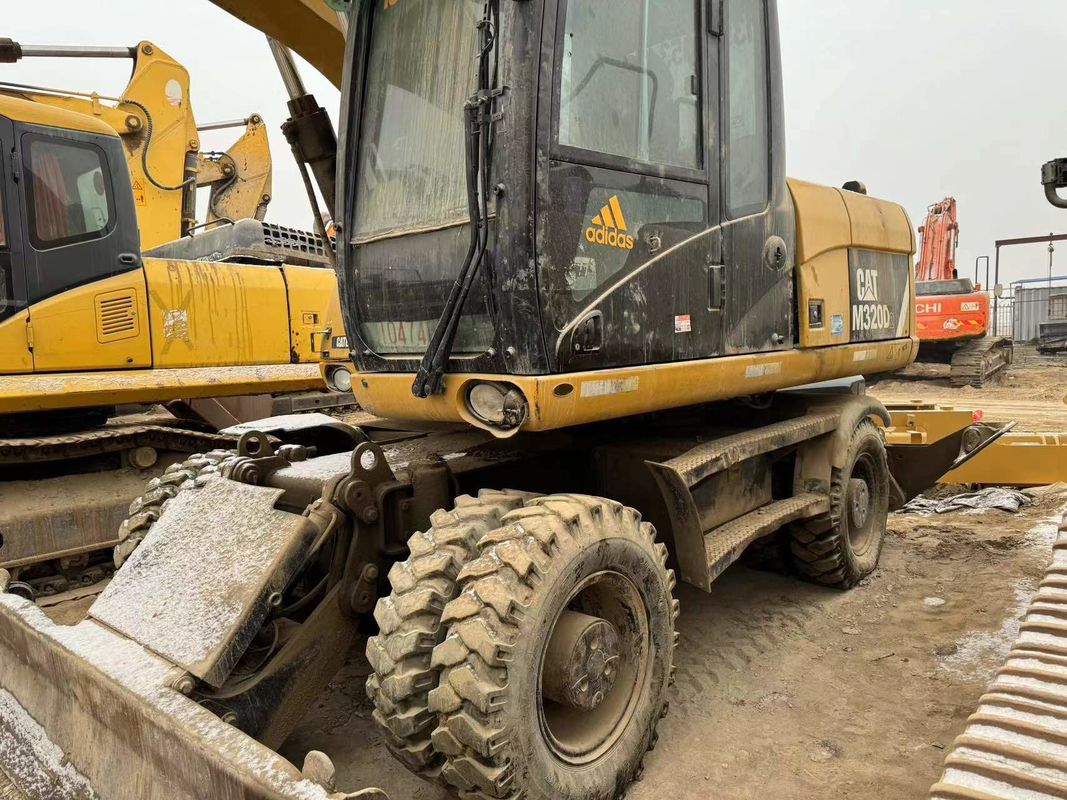 90% Caterpillar M317D2 Подержанный колесный экскаватор с высоким качеством и лучшими характеристиками для продажи