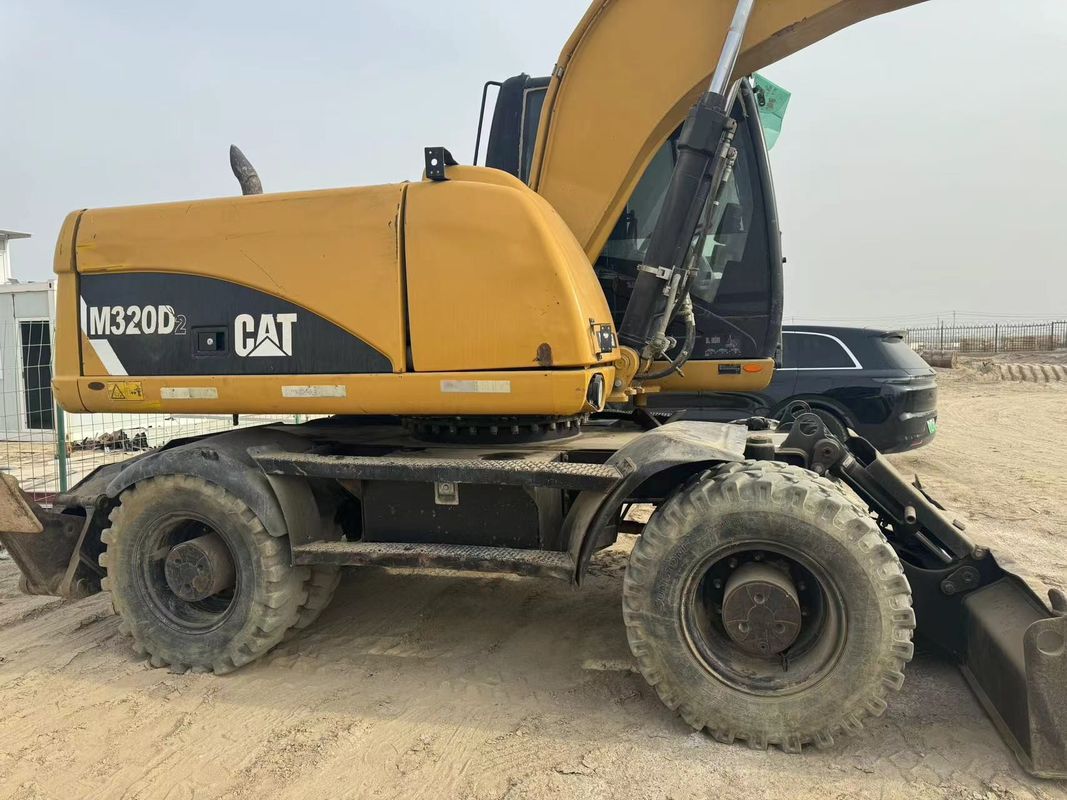 90% Caterpillar M317D2 Подержанный колесный экскаватор с высоким качеством и лучшими характеристиками для продажи