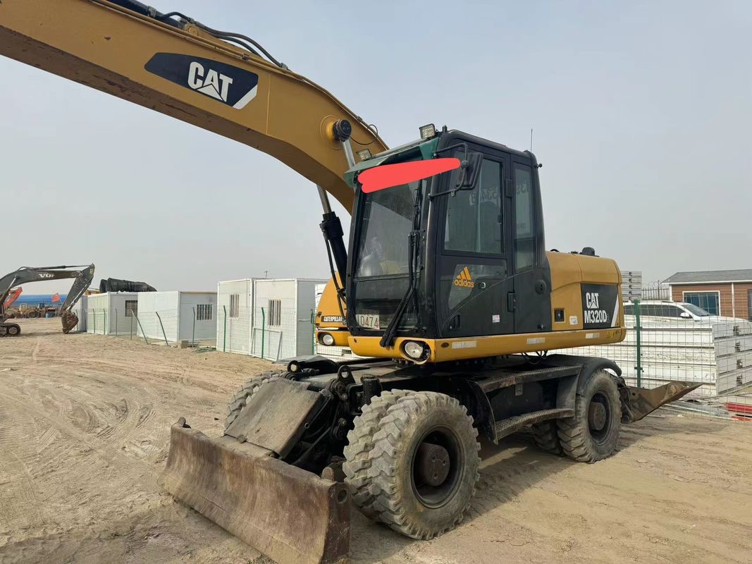 90% Caterpillar M317D2 Подержанный колесный экскаватор с высоким качеством и лучшими характеристиками для продажи