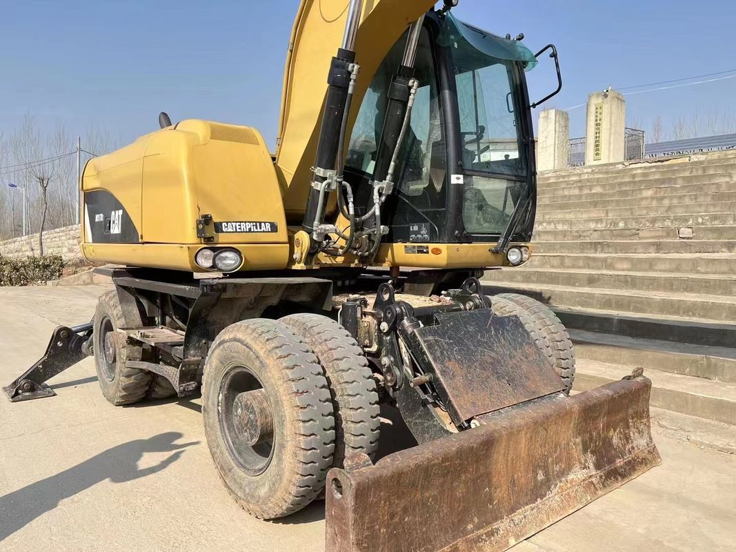 90% Caterpillar M317D2 Подержанный колесный экскаватор с высоким качеством и лучшими характеристиками для продажи