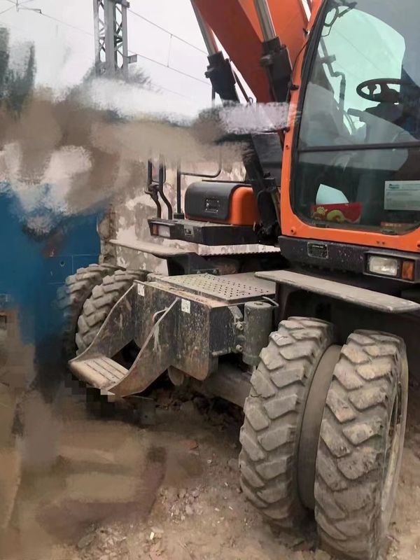 15 тонн Корея импортировала 90% нового Doosan DX 140W Подержанный колесный экскаватор с высоким качеством и лучшими характеристиками для продажи