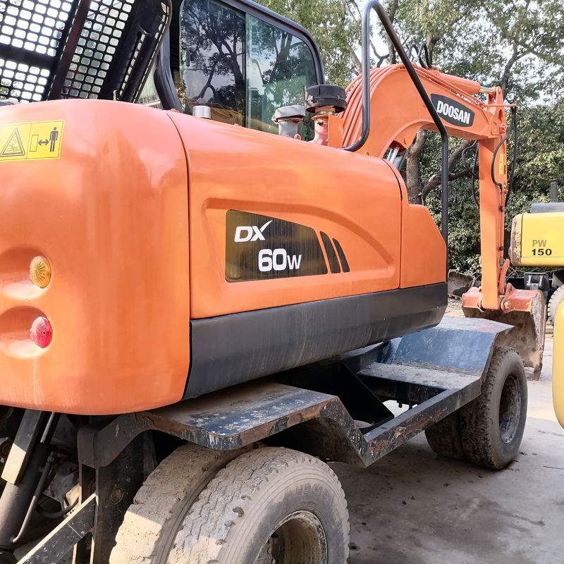 5 тонн Корея импортировала 90% нового Doosan DX 60W Подержанный колесный экскаватор с высоким качеством и лучшими характеристиками для продажи