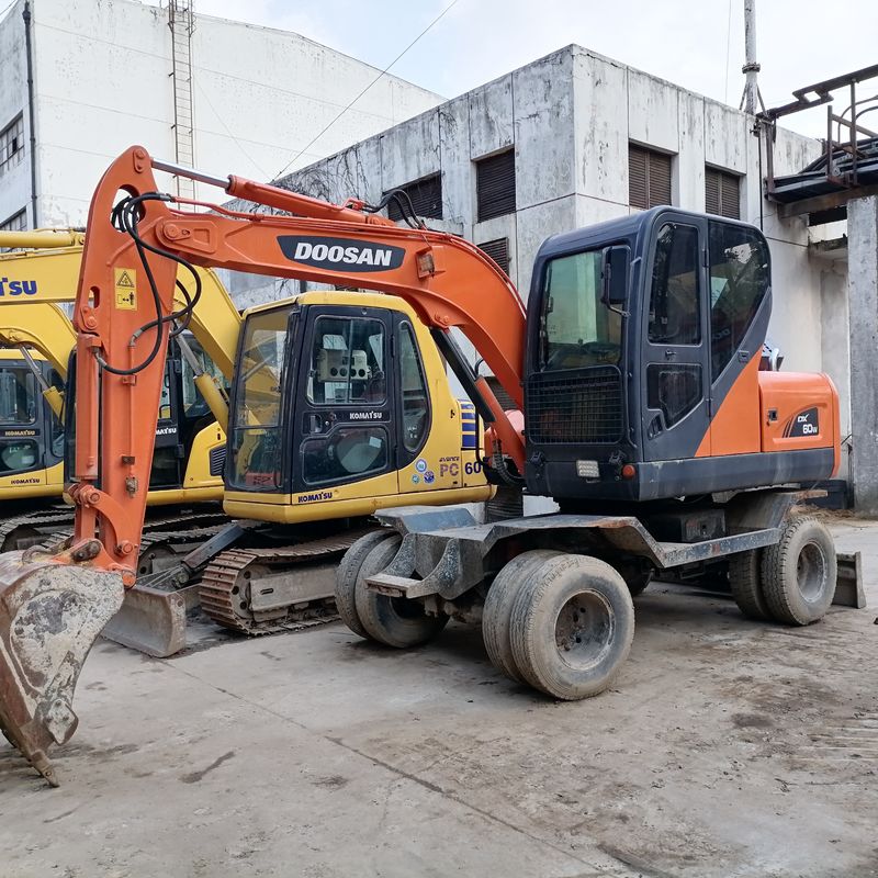 5 тонн Корея импортировала 90% нового Doosan DX 60W Подержанный колесный экскаватор с высоким качеством и лучшими характеристиками для продажи